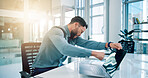 Business, man and punch laptop in office for bad news, pc glitch and frustrated for proposal fail. Angry, male person and violence with tech for software error, property vandalism and mistake tantrum
