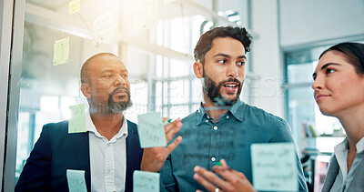Buy stock photo Collaboration, ideas and business people at glass with teamwork, sticky note and brainstorming in office. Strategy, problem solving and planning with moodboard for growth, development and discussion