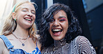 Friends, women and portrait with fashion in city with streetwear style, trendy clothes or casual outfit. Gen z, happy people or bonding with confidence, laughing or low angle on weekend break in town