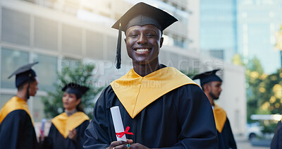 Buy stock photo Man, student and graduation with diploma in city, education and pride for achievement at college campus. Person, excited and certificate for learning, scholarship or outdoor in portrait at university