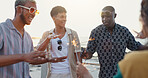Beach, friends and dance with sparklers for holiday, social gathering and new year party. Celebration, firework stick and group of happy people outdoor for travel, summer vacation and laughing at sea