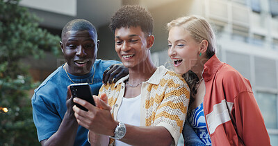 Buy stock photo Surprise, people and group in city, smartphone and message to contact, urban town and social media. Outdoor, meme and friends in street, cellphone and texting with shock, gen z and reaction to chat