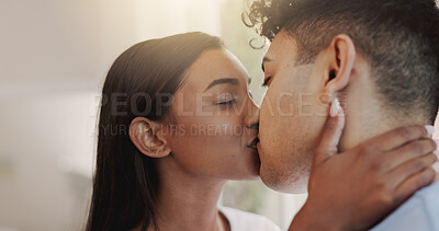 Buy stock photo Kiss, love and security with couple in home together for morning affection, bonding or wake up. Romance, safety or trust with man and woman in apartment for commitment, marriage or relationship
