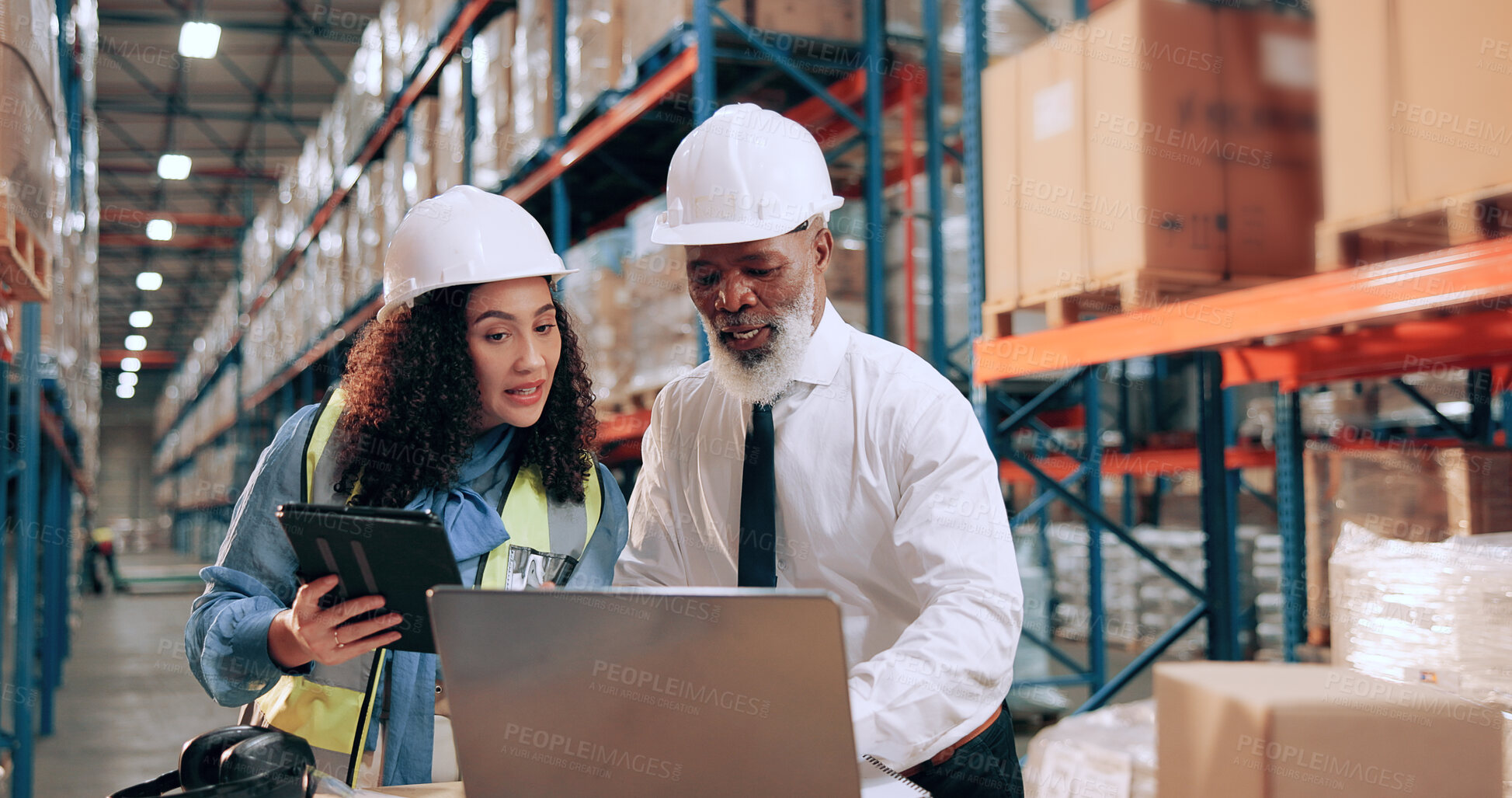 Buy stock photo Man, woman and discussion at warehouse with laptop, logistics and tablet for supply chain management. People, mentor and happy with review, stats or planning for inventory at industrial storage plant