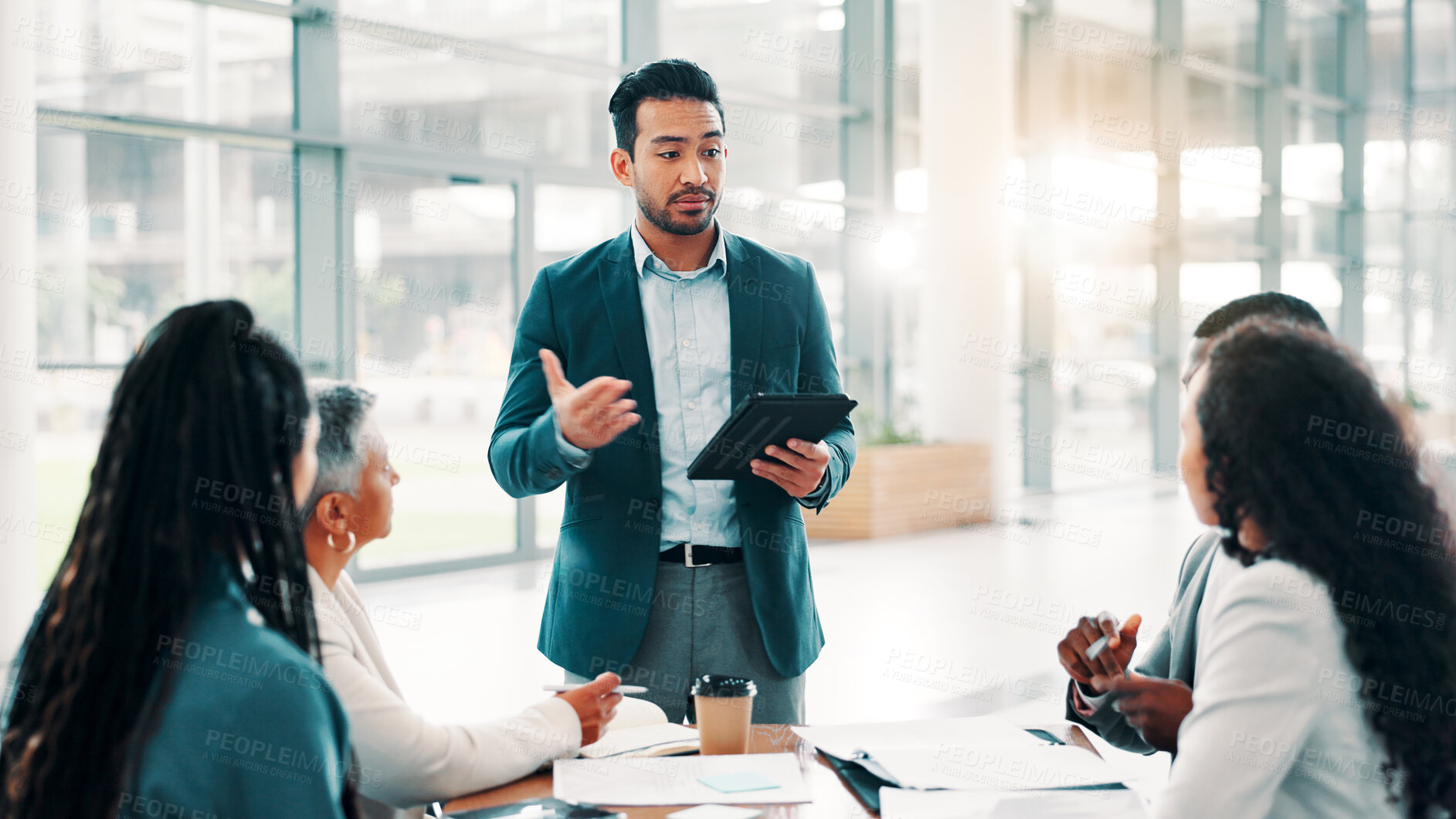 Buy stock photo Businessman, discussion and tablet in office for meeting, campaign management and project feedback. Company team, leader and workshop with tech for brainstorming, presentation planning and advice
