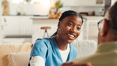 Buy stock photo Smile, trust and nurse with old man on sofa for healthcare advice, kindness and support. Medical caregiver, retirement and consulting with senior patient in nursing home for help and elderly care