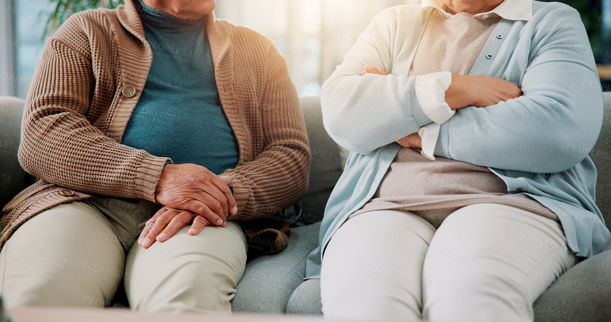 Buy stock photo Home, hands and senior couple with conflict in marriage, argument and disagreement in living room. Sofa, elderly man and old woman with body language for toxic relationship, breakup and fighting