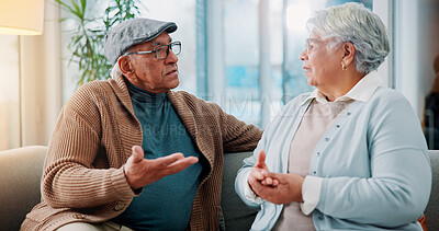 Buy stock photo Senior couple, argument and sofa at house for fighting, divorce conflict and partner disagreement. Elderly people, communication problem and confront of separation, marriage crisis and betrayal drama