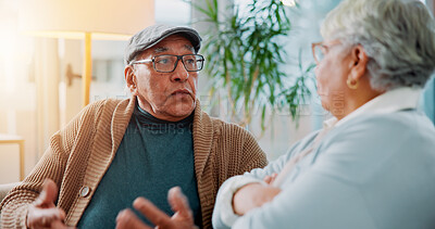 Buy stock photo Senior couple, fighting and sofa at house for argument, divorce conflict and partner disagreement. Elderly people, communication problem and blame for separation, marriage crisis and betrayal drama