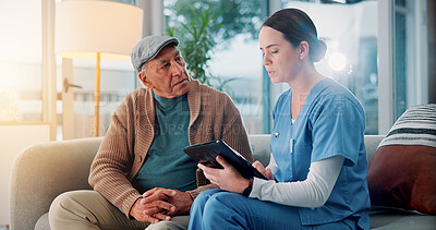 Buy stock photo Home, old man and nurse with tablet for consultation, checkup and feedback for medical information. House, senior person and caregiver with tech for diagnosis update, discussion or healthcare on sofa