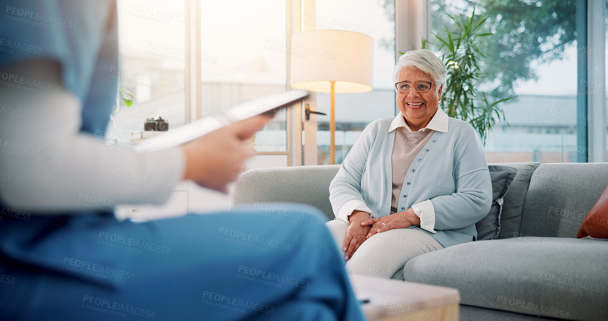 Buy stock photo Tablet, advice and smile with nurse and old woman on sofa for counseling, psychologist and talking. Support, healthcare and psychiatrist with senior person in office for therapy and consulting