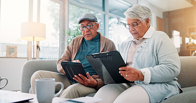 Buy stock photo Senior couple, tablet and clipboard at house for finance planning, review bills and payment checklist. Elderly people, digital and document for investment, insurance application and asset management