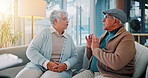 Home, sofa and senior couple with fight in marriage, argument and disagreement in living room. Couch, elderly man and old woman with conflict for toxic relationship, breakup and anger for divorce