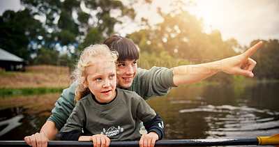 Buy stock photo Lake, child and woman with pointing for kayak, water activity and adventure in summer camp. River, female instructor and girl with learning for canoeing, skills development and paddle outdoor in boat