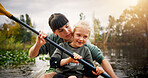 Kayak, mother and child with learning in lake, water activity and adventure for bonding together. River, mom and girl kid with paddle for canoeing, travel holiday and rowing outdoor as family in boat