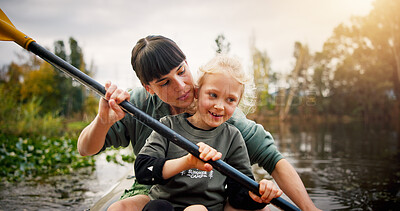 Buy stock photo Lake, woman and kid with learning for kayak, water activity and adventure in summer camp. River, child and female instructor with teaching for canoeing, skills development and paddle outdoor in boat