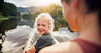 Girl, mom and happy with canoe, river and outdoor on vacation with bonding, adventure or nature. People, mother and daughter with boat, kayak and smile on lake, water and summer on vacation in France