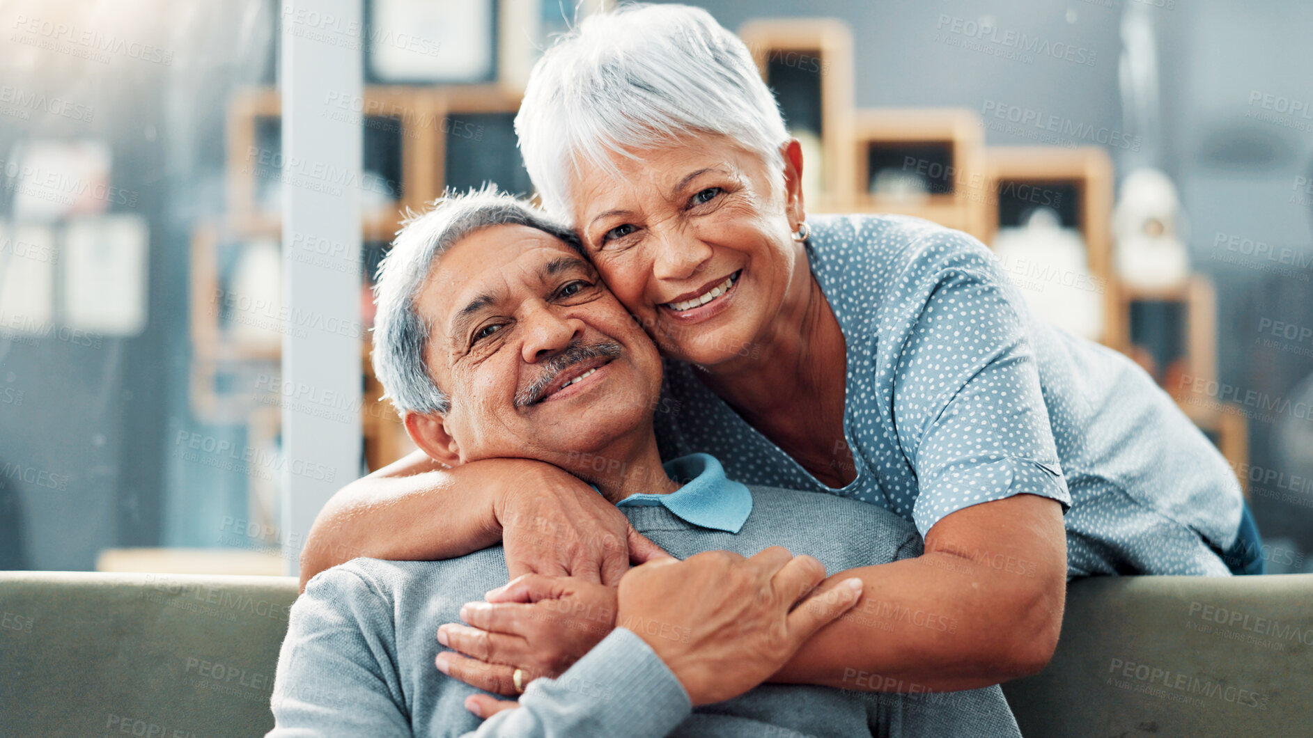 Buy stock photo Portrait, hug and old couple with smile, home and bonding together with marriage in living room. Face, support and senior man with elderly woman, embrace and retirement with relationship and loving