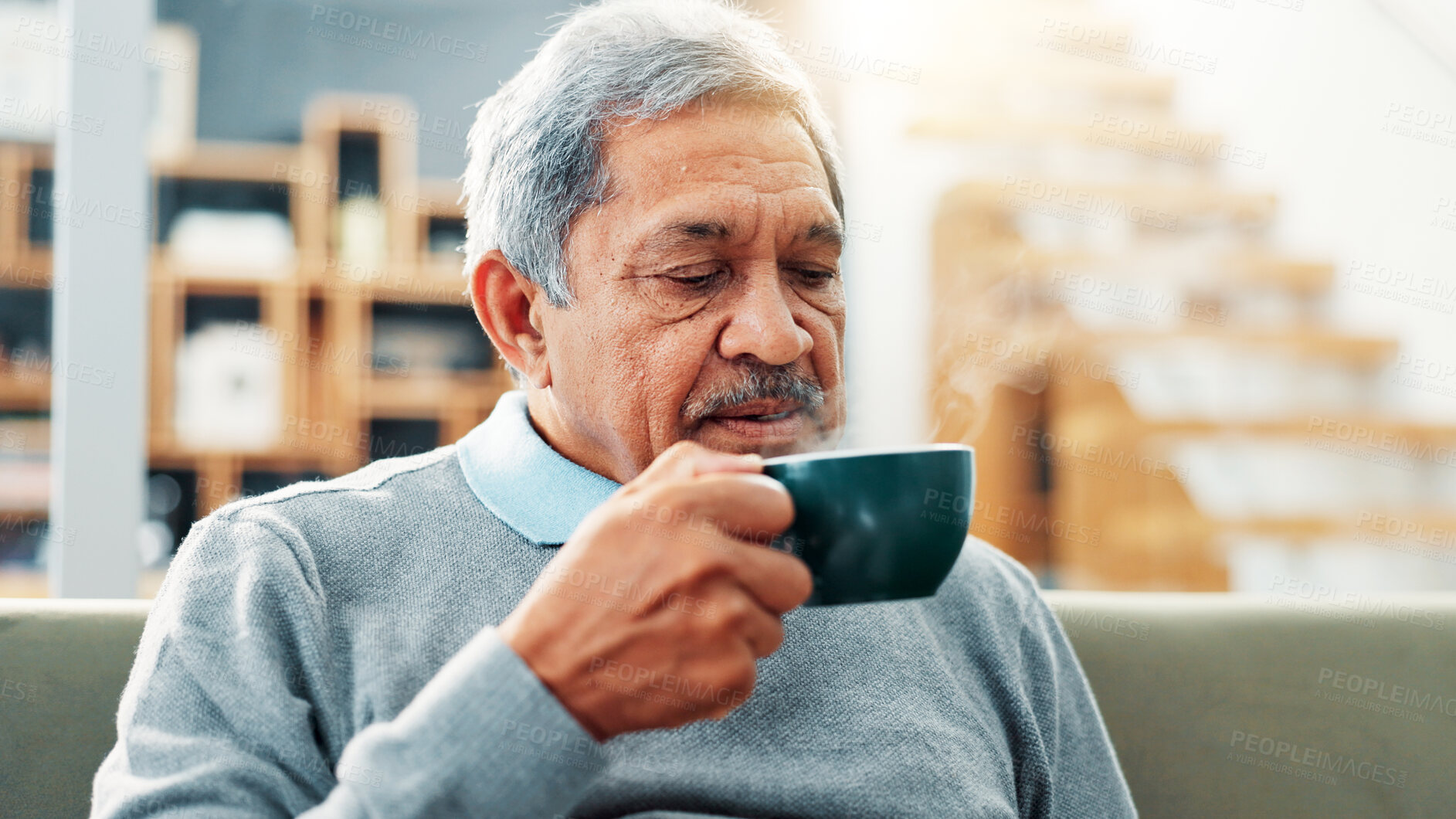 Buy stock photo Relax, drinking and senior man with coffee on sofa for calm, peace and morning routine. Happy, cappuccino and elderly male person enjoying cup of tea on couch in living room at retirement home.