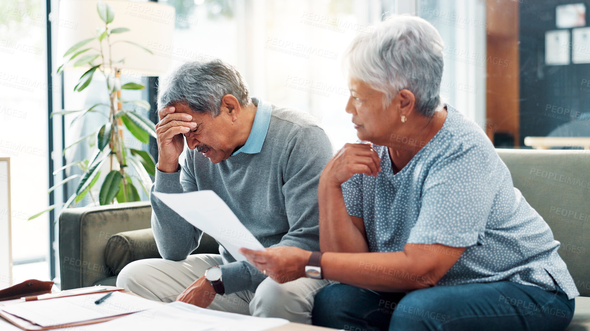 Buy stock photo Stress, finance documents and senior couple in home with debt, mortgage or bills with budget struggle. Frustration, paperwork and elderly man with woman for planning retirement account in house.
