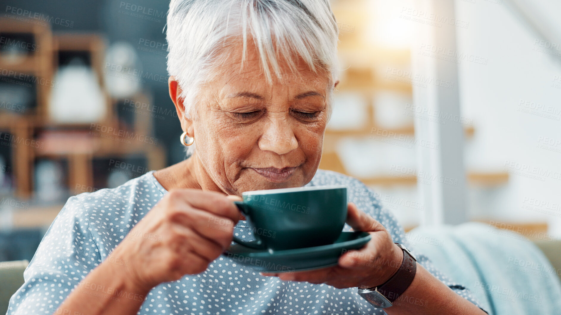 Buy stock photo Calm, drinking and senior woman with coffee on sofa for relax, peace and morning routine. Happy, cappuccino and elderly female person enjoying cup of tea on couch in living room at retirement home.