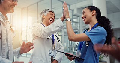 Buy stock photo Nurse, doctor and celebration high five with tablet for healthcare excellence, surgery success and good news. Medicine staff, people and happy at hospital for medical results and achievement support