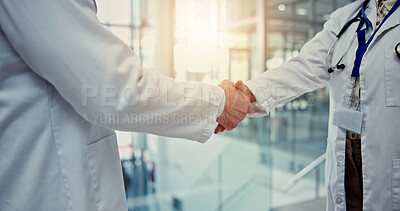 Buy stock photo Doctors, teamwork and shaking hands for welcome, success or promotion goal in hospital meeting. Closeup, congratulations or proud healthcare worker with handshake for medical collaboration thank you