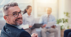 Portrait, happy businessman and mature ceo in investment meeting, coworking and private equity in office. Smile, manager and corporate professional with glasses or confident boss at venture capital