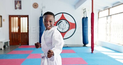 Buy stock photo Karate, portrait and smile of boy child in dojo for combat, martial arts or sports training. Exercise, fitness and workout with happy African student in gym for education, development or growth