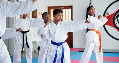 Buy stock photo Fitness, karate and learning with kids in class for combat, fighting or self defense training. Development, exercise or sports with children and sensei in dojo for martial arts lesson or practice