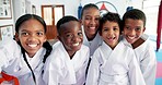 Children, friends and portrait with selfie in dojo for martial arts training, self defense or fighting competition. Kids, smile and team with support for taekwondo challenge or community karate