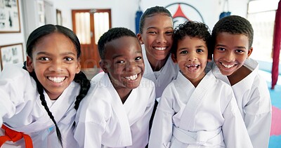 Buy stock photo Children, friends and portrait with selfie for karate, martial arts training and self defense or fighting competition. Kids, smile and team excited for taekwondo challenge or community dojo or gym