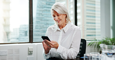 Buy stock photo Business, smile and woman in office, cellphone or texting with social media, accounting or email. Mature person, financial advisor or employee in workplace, smartphone or online for investment report