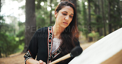 Buy stock photo Outdoor, woman and shaman with drum for sound, spiritual healing and traditional performance. Nature, female person and healer with music for holistic therapy, wellness and ritual practice in woods