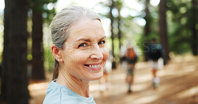 Buy stock photo Hiking, nature and portrait of mature woman with smile for exercise, workout and walking for wellness. Fitness, travel and person in forest and woods for trekking, adventure and journey outdoor