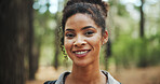Hiking, happy and portrait of woman in forest for exercise, workout and walking for wellness. Fitness, travel and face of person in forest, trail and woods for trekking, adventure and journey outdoor