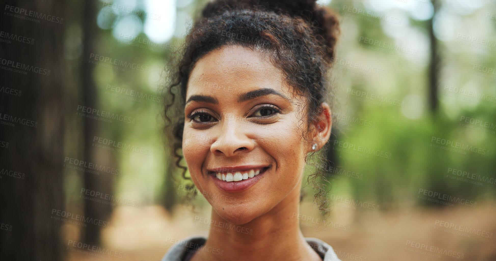 Buy stock photo Woman, portrait and happy with hiking in forest for travel adventure, weekend break and sightseeing nature. Smile, person and trekking in woods for holiday exploration, outdoor journey and confidence