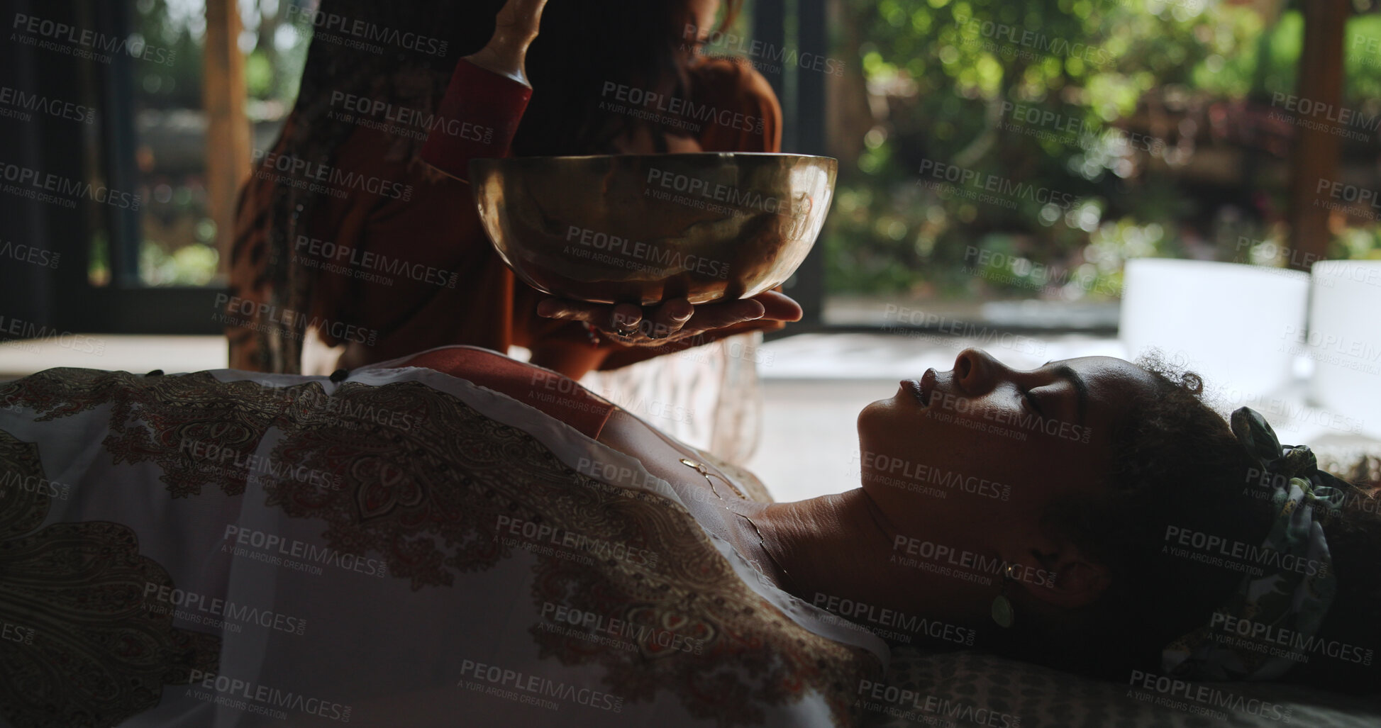 Buy stock photo Spiritual, ritual and woman with healer, hands and sound therapy for self awareness, healing and calm. Meditation, person and shaman with Tibetan bowl for mantra, holistic and chant for inner peace