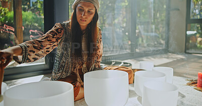 Buy stock photo Natural healing, woman and bowls with naturopath for Buddhism, ceremony and meditation in studio. Female healer, sandalwood and sound therapy for spirituality with incense or alternative medicine