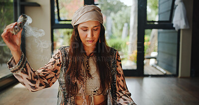 Buy stock photo Smudging, woman and sage with smoke, sacred and burning herb for purification and indigenous tradition. Chakra, spiritual and person with Salvia apiana for prayer, morning and ritual for inner peace