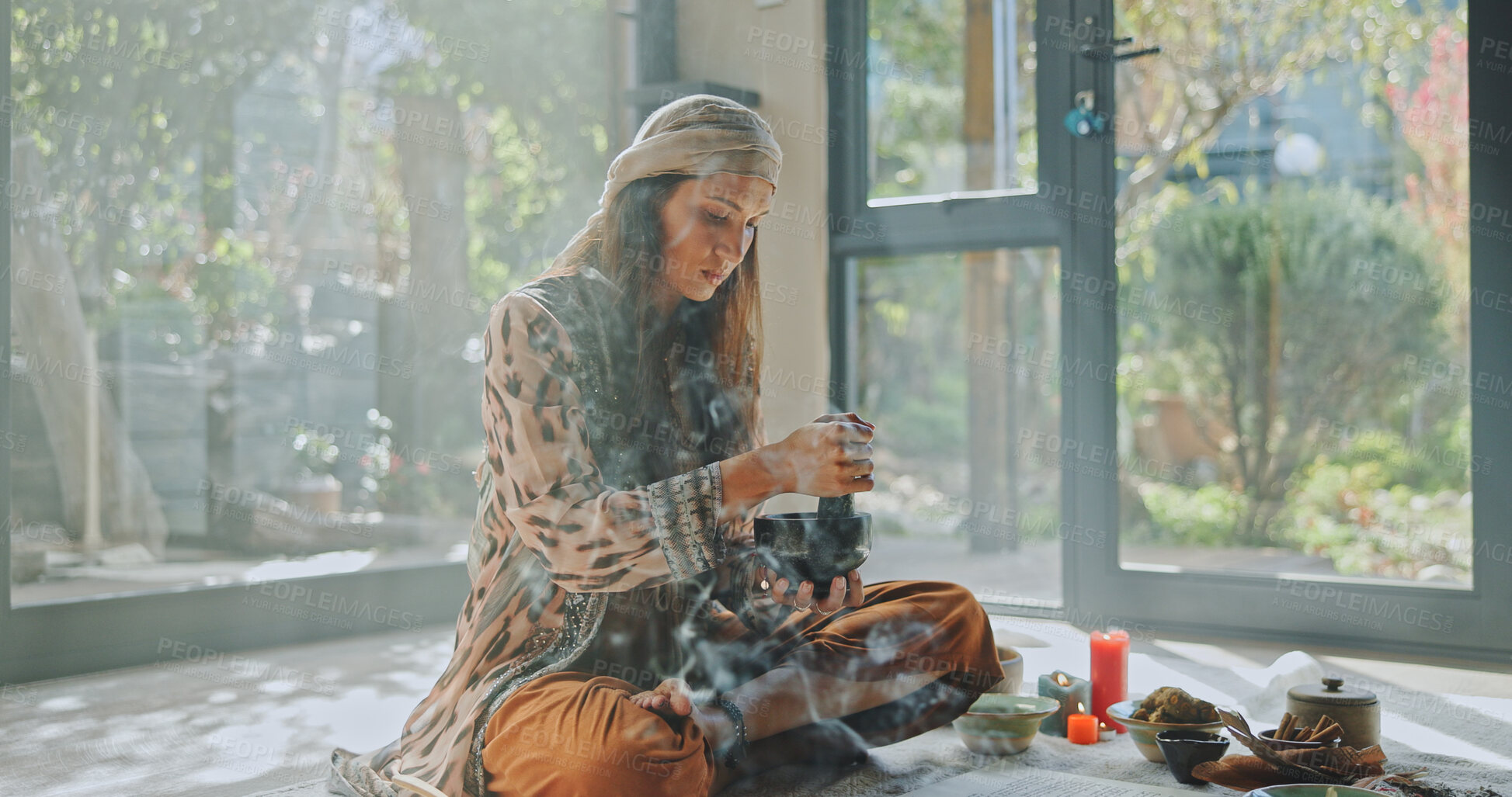 Buy stock photo Woman, alternative medicine and meditation with naturopath for Buddhism, ceremony and culture in studio. Female healer, herbs and aromatherapy for spirituality with chakra clean or natural healing