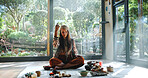 Natural healing, naturopath and smoke with woman for cleaning, ceremony and meditation in studio. Female healer, sandalwood and aromatherapy for spirituality with incense or alternative medicine