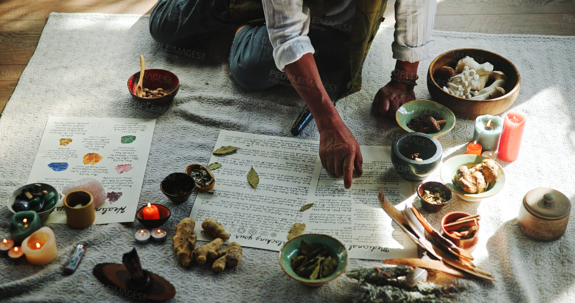 Buy stock photo Crystal, paper and hands of person on floor for spiritual meditation, holistic treatment and alternative medicine. Aromatherapy, above and healer with stones for peace, chakra and detox for wellness