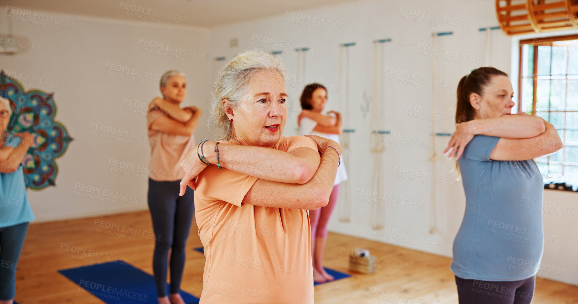 Buy stock photo Yoga class, senior women and stretching with fitness, spiritual wellness and pilates with energy. Elderly people, balance or group in health club, exercise and retirement care with challenge and calm