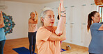 Yoga class, elderly women and fitness with instructor, spiritual wellness and pilates with balance. Senior people, trainer and group in health club, calm and coach with exercise, energy or stretching