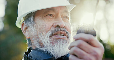 Buy stock photo Building, radio and thinking with developer man outdoor on excavation site as construction worker. Communication, development and update with mature Asian person talking for architecture or planning