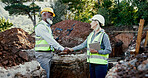Construction site, contractor and people shaking hands for partnership outdoor for development. Man, woman or engineers together for excavation, agreement or collaboration with handshake or deal
