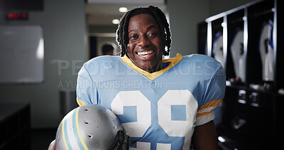 Buy stock photo Black man, American football player and excited for portrait in locker room, pride and ready for sports. Person, professional athlete and smile with confidence, career and helmet at club in USA