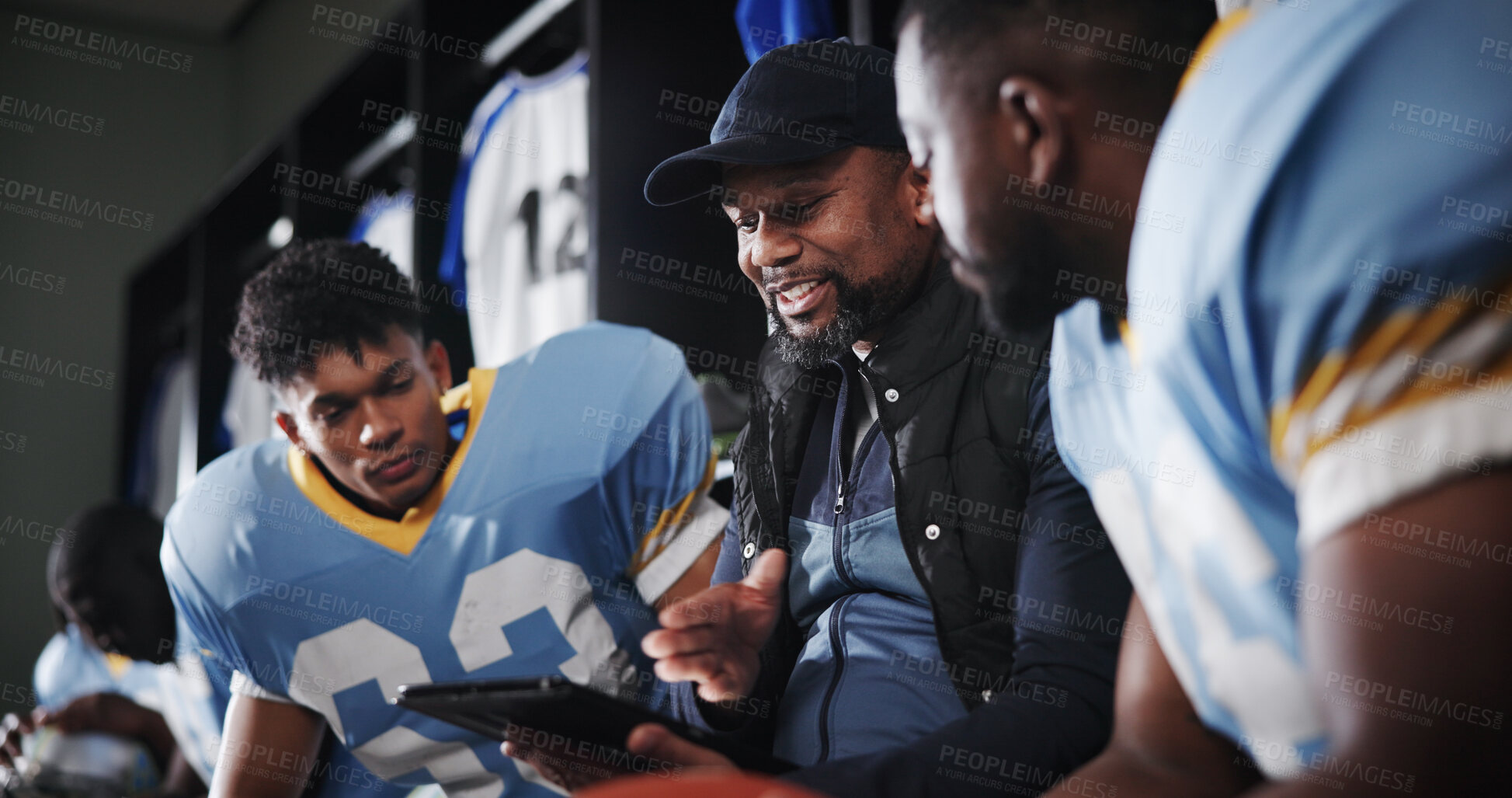 Buy stock photo Tablet, coaching and football team with men in locker room for game plan, sports strategy or defense formation. Touchdown tactics, match feedback and discussion with people and advice for training