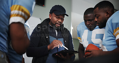 Buy stock photo Tablet, coaching and football with team in locker room for game plan, sports strategy or defense formation. Touchdown tactics, match feedback and discussion with people and advice for training